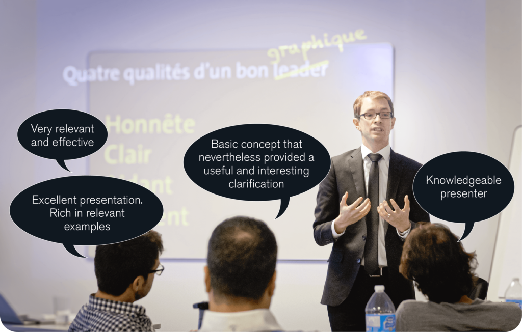 Francis, dressed in a suit and tie, stands expressing himself with his hands. Behind him, his PowerPoint slide is projected on the wall. It reads: "Four qualities of a good graph: Honest, Clear, Helpful, Efficient". In the foreground, several people sit listening in silence. Above their heads, black bubbles (phylacteries) contain feedback received by participants after the training. They read, for example: "Very relevant and effective", "Presenter with a lot of knowledge".